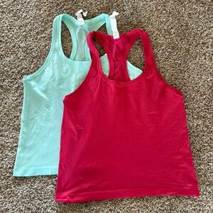 Lululemon Swiftly Tech tanks, size 8. Waist length. Like new.